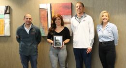Sioux Empire United Way presents Business of the Year award to Julie Engebretson and Jason Appel